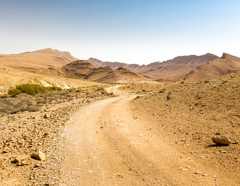 Desert road crater Arif mountains ridge cliffs scenic view landscape, travel destination nature  Negev Israel.