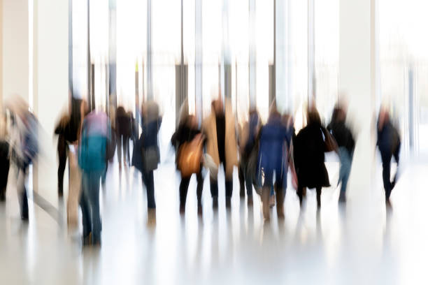 istock Silhouettes of people in a modern interior 937888368
