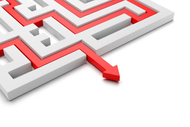 istock Red Arrow Coming Out of a Maze 937890564