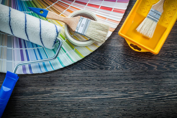 istock Paint brushes roller tray color pantone adhesive tape 937890578