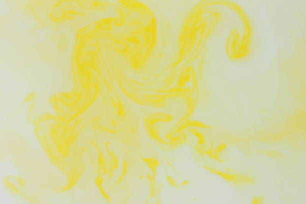 istock Abstract yellow background, pastel pattern, yellow paint in white liquid, stains on milk, art, minimalistic background, blank for designer, pop art, creative layout 937891342