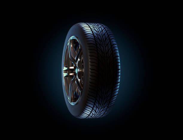 istock Car rim and tyre standing on asphalt road 937891582