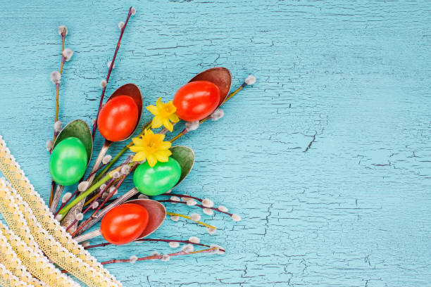 istock Creative Easter bouquet. Easter eggs, spoons, willow branch, lace, flowers. Top view, copy space, Easter background 937893974
