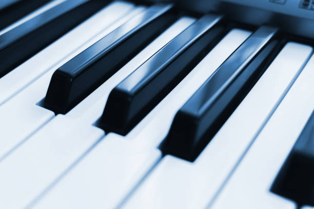Piano keys toned,close-up photo. Side view. Electronic synthesizer