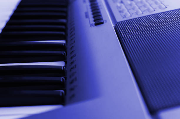 istock Piano keys and speaker toned,close-up. Side view. 937894004