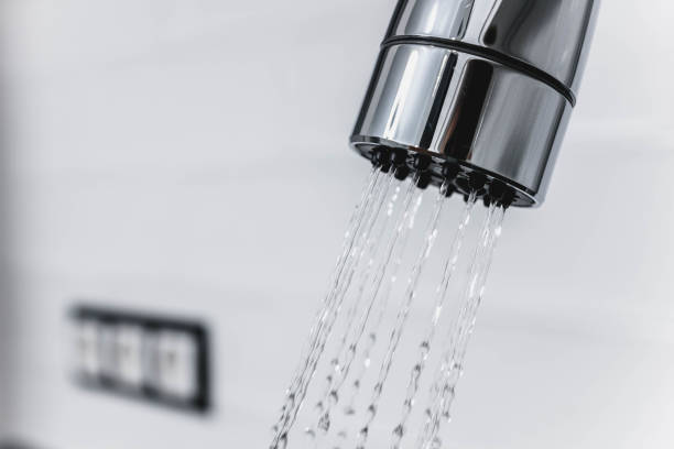 istock modern chrome-plated kitchen faucet in shower 937896246