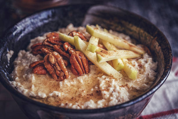 Homemade Pecan Porridge with Pears Homemade Pecan Porridge with Pears served for Breakfast bran flakes stock pictures, royalty-free photos & images