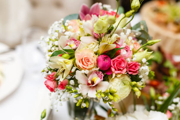 istock elegant wedding bouquet on table at restaurant 937907354