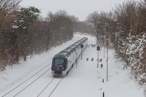 Vordingborg Denmark - February 3. 2018: A DSB IC4 train set leaving Vordingborg train station in Denmark