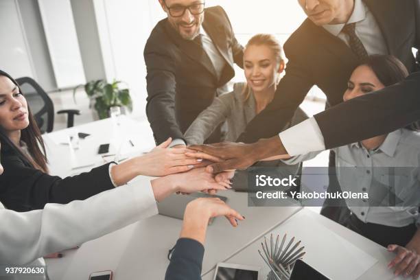 Happy Business Partners Creating Union Stock Photo - Download Image Now - Teamwork, Business, Joy