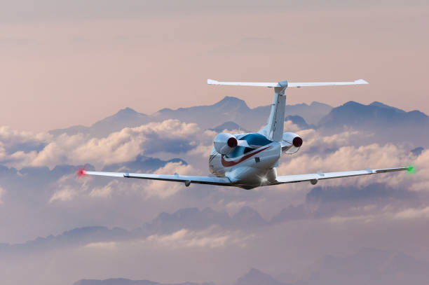 istock Privat plane or aircraft flight surrounded by mountains and rocks. Front view, close up 937926708