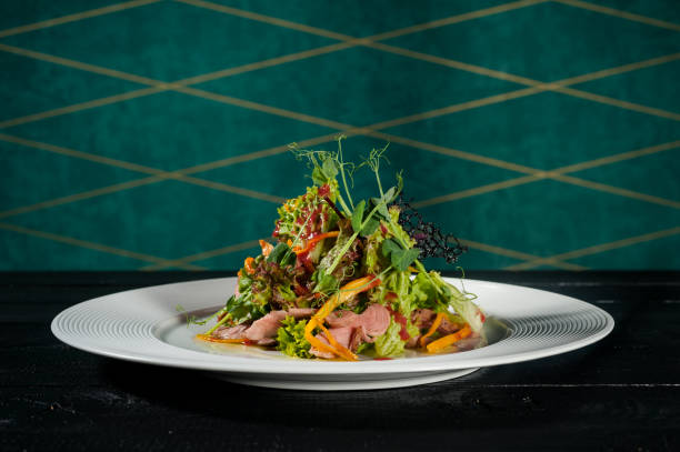istock restaurant meal Salad with herbs 937932652