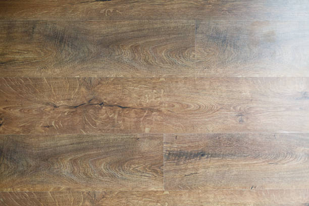 texture of wooden worm colored parquet floor