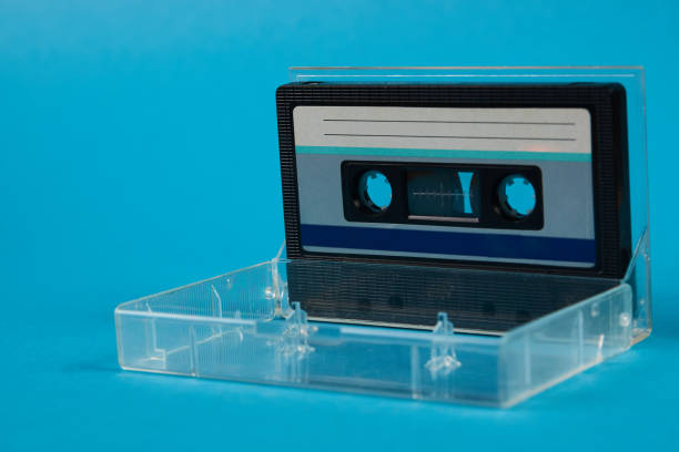 Blank cassette tape box with retro cassette on blue background