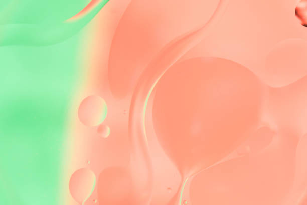 istock mix water and oil, color background with soft defocusing, macro abstract 937954076