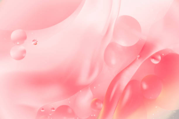 istock mix water and oil, color background with soft defocusing, macro abstract 937954112