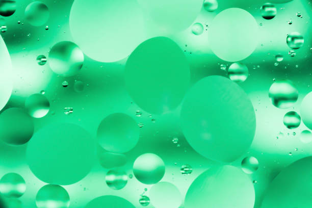 istock mix water and oil, color background with soft defocusing, macro abstract 937954272