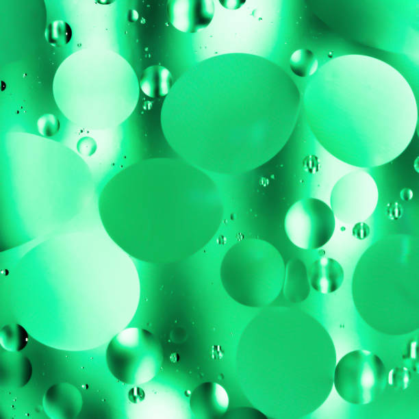 istock mix water and oil, color background with soft defocusing, macro abstract 937954278