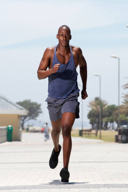 istock african american man running outside 937965728