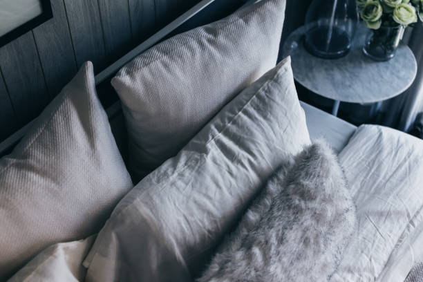 istock light soft pillow on beautiful bed cozy bedroom with sun light from window interior concept 937965936