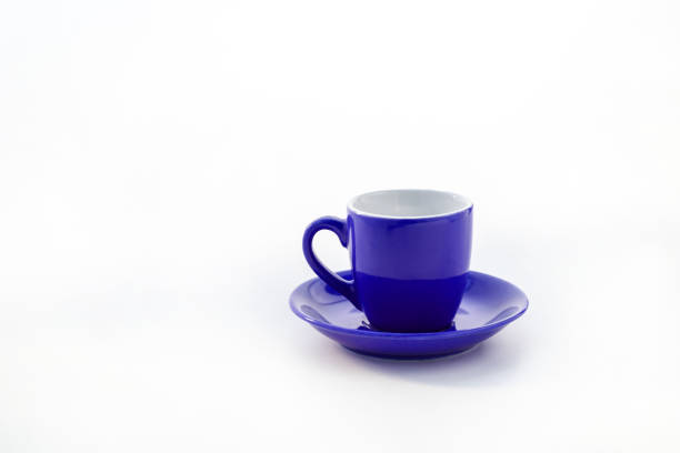istock cup and saucer isolated on white background 937966372