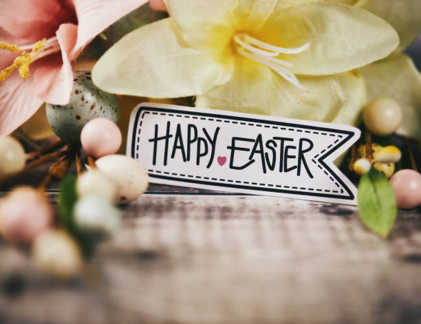 Easter background with lily flowers and message