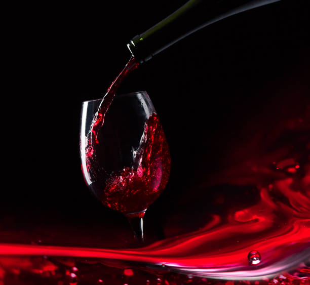 istock Bottle and glass of red wine . 937976840