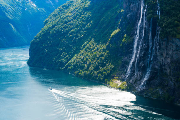 istock Summer landscape with fjord and waterfall, Norway 937976860
