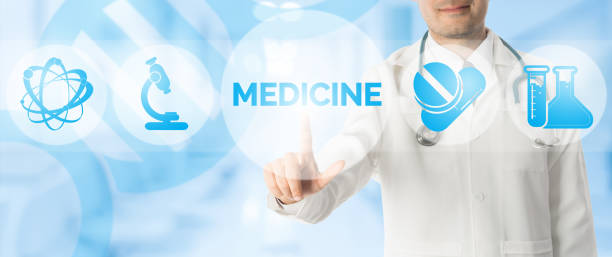 istock Doctor Points at MEDICINE with Medical Icons 937982946