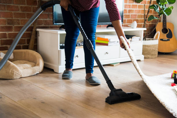 Black woman is cleaning room