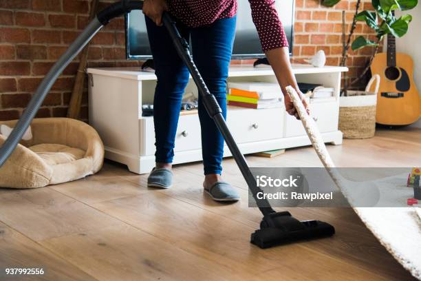 Black Woman Is Cleaning Room Stock Photo - Download Image Now - Cleaning, Vacuum Cleaner, Housework