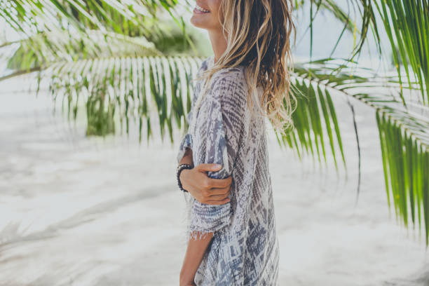 Dreamy girl on beach Dreamy girl on beach beach fashion stock pictures, royalty-free photos & images