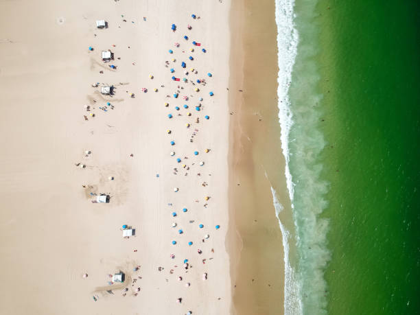 istock Aerial view of Copacabana beach during summer, sun with clouds 938004846