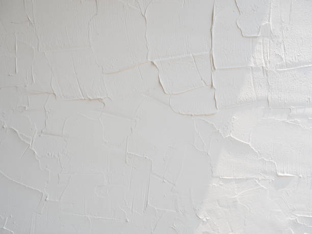 istock The sun is casting over the white textured concrete wall,sunshade shadow 938009198