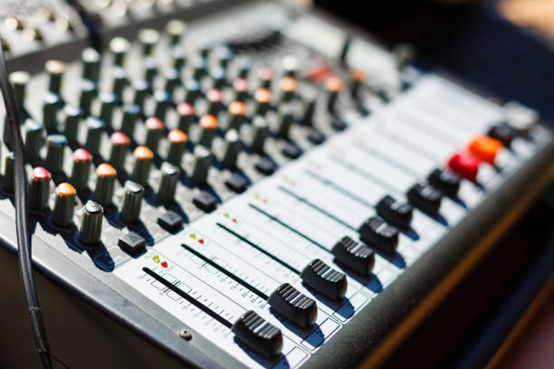 istock professional music mixer, macro photo music remote control, professional sound. Technical progress in music. Film texture Unfocused 938020464