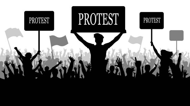 istock Silhouette crowd of people protesters. Protest, conflict, revolution 938026554