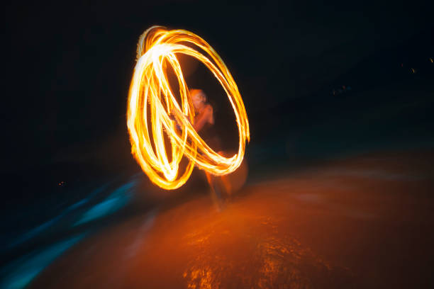 istock Woman fire dancing at full moon party, Koh Phi Phi Island 938034914