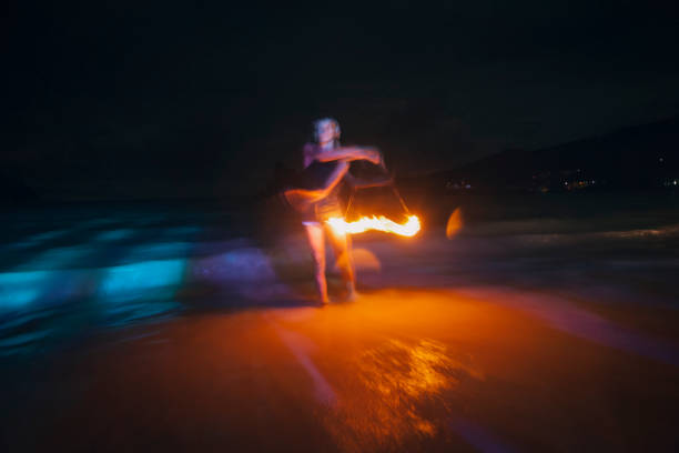 istock Woman fire dancing at full moon party, Koh Phi Phi Island 938035020