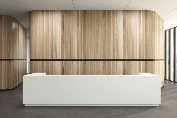 istock White reception in a wooden office lobby 938041264