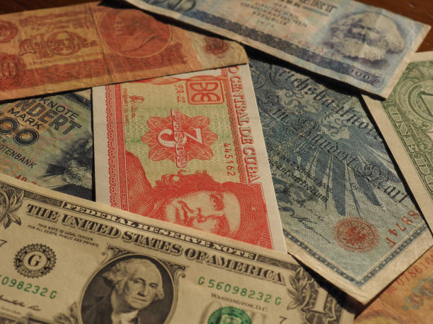 istock vintage money of communist countries and dollar notes 938046498