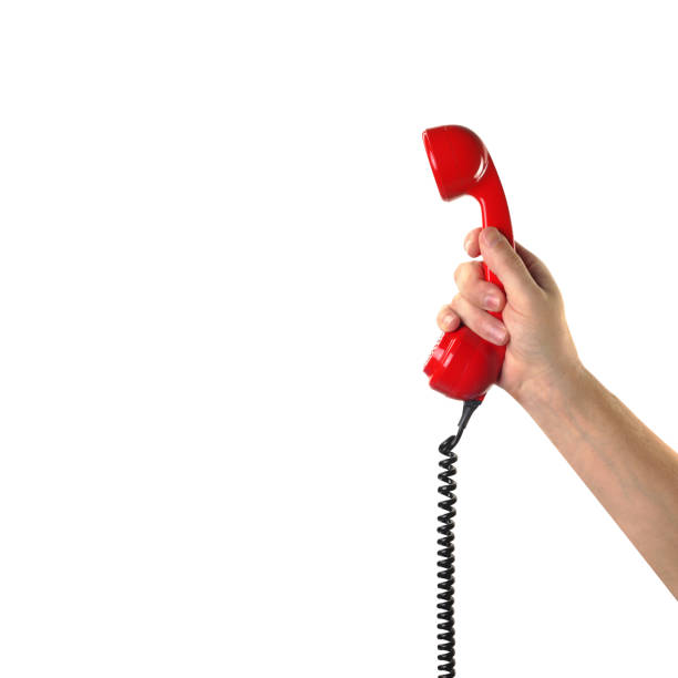 istock Objects Hands action - Hand holds retro phone red handset. Isolated 938051032