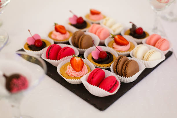 istock French macaroni on a plate - macarons, shoot made with a small depth of field 938058118