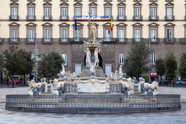 Fountain of Neptune in Naples Naples, Italy - March 19 2018: The Fountain of Neptune (Italian: Fontana del Nettuno) is a monumental fountain, located in Municipio square. fountain of neptune naples photos stock pictures, royalty-free photos & images