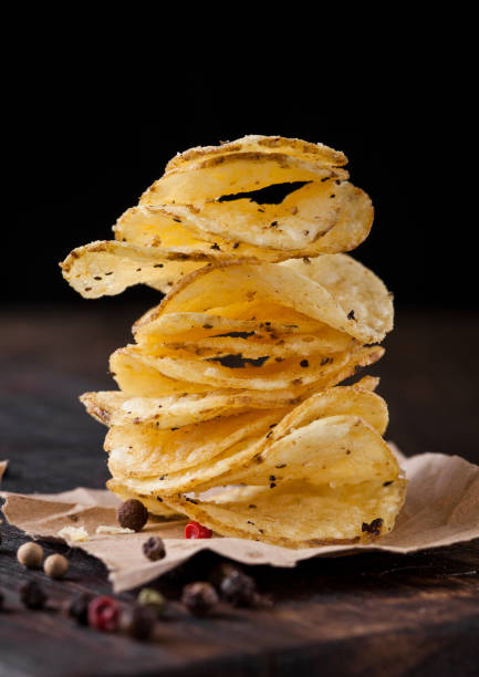 istock Crispy delicious pepper potato crisps chips snack 938071646