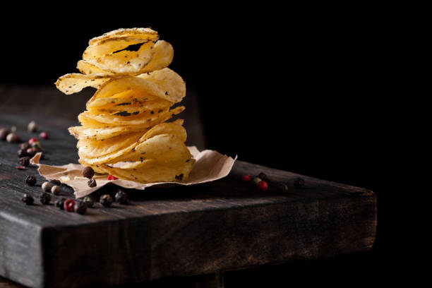 istock Crispy delicious pepper potato crisps chips snack 938072498
