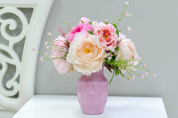 istock Interior design of room with beautiful flowers 938079486