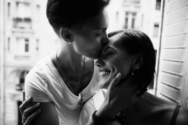 Close-up portrait of happy lesbian couple stock photo