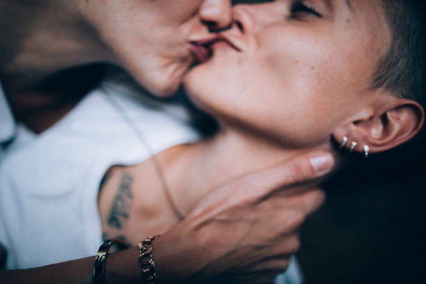 Close-up of lesbian couple kissing stock photo