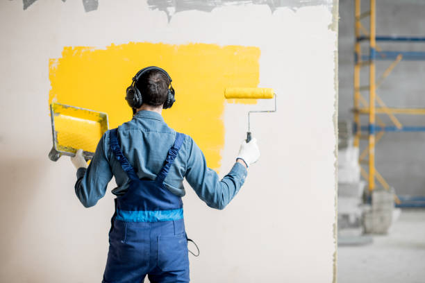Painter listening to the music during the work