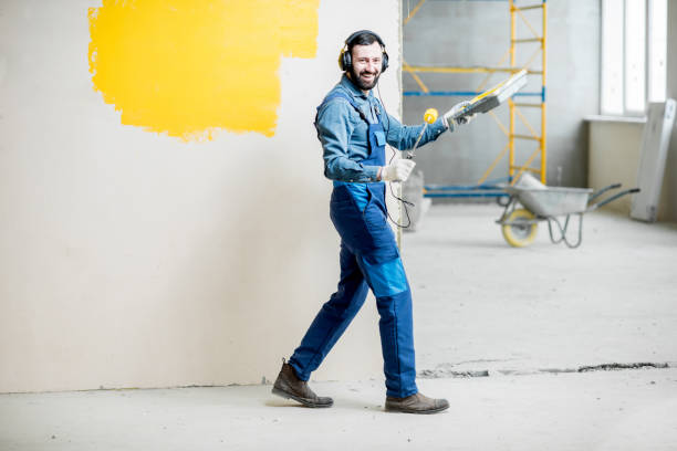 Painter listening to the music during the work